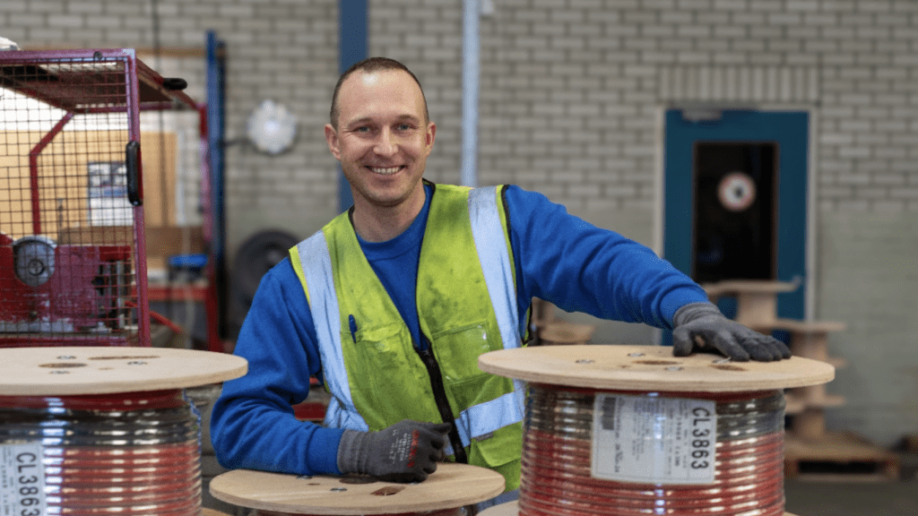 Smiling man with cables